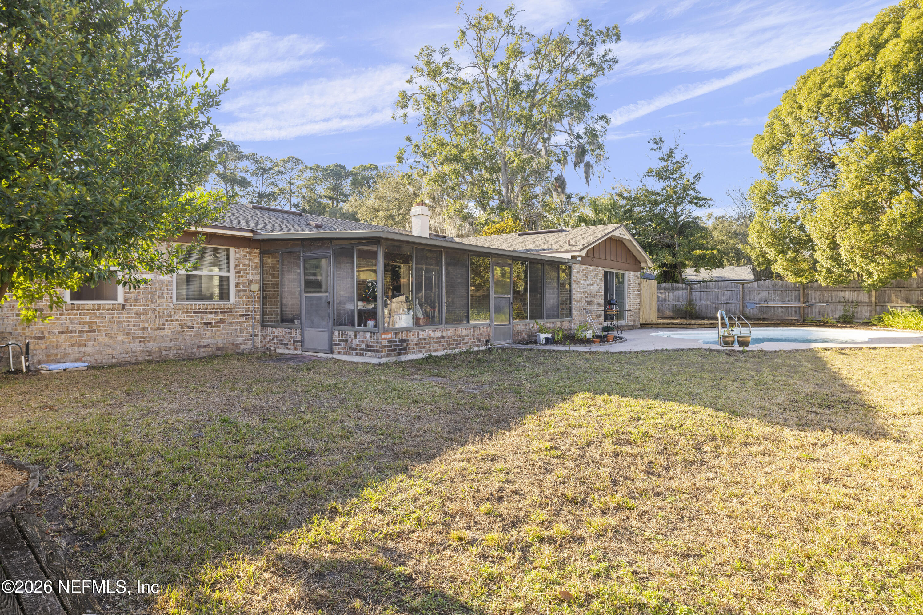 2495 Aquarius Road Orange Park, FL 32073 - Photo 23 of 29 BACKYARD TO POOL AND SUNROOM