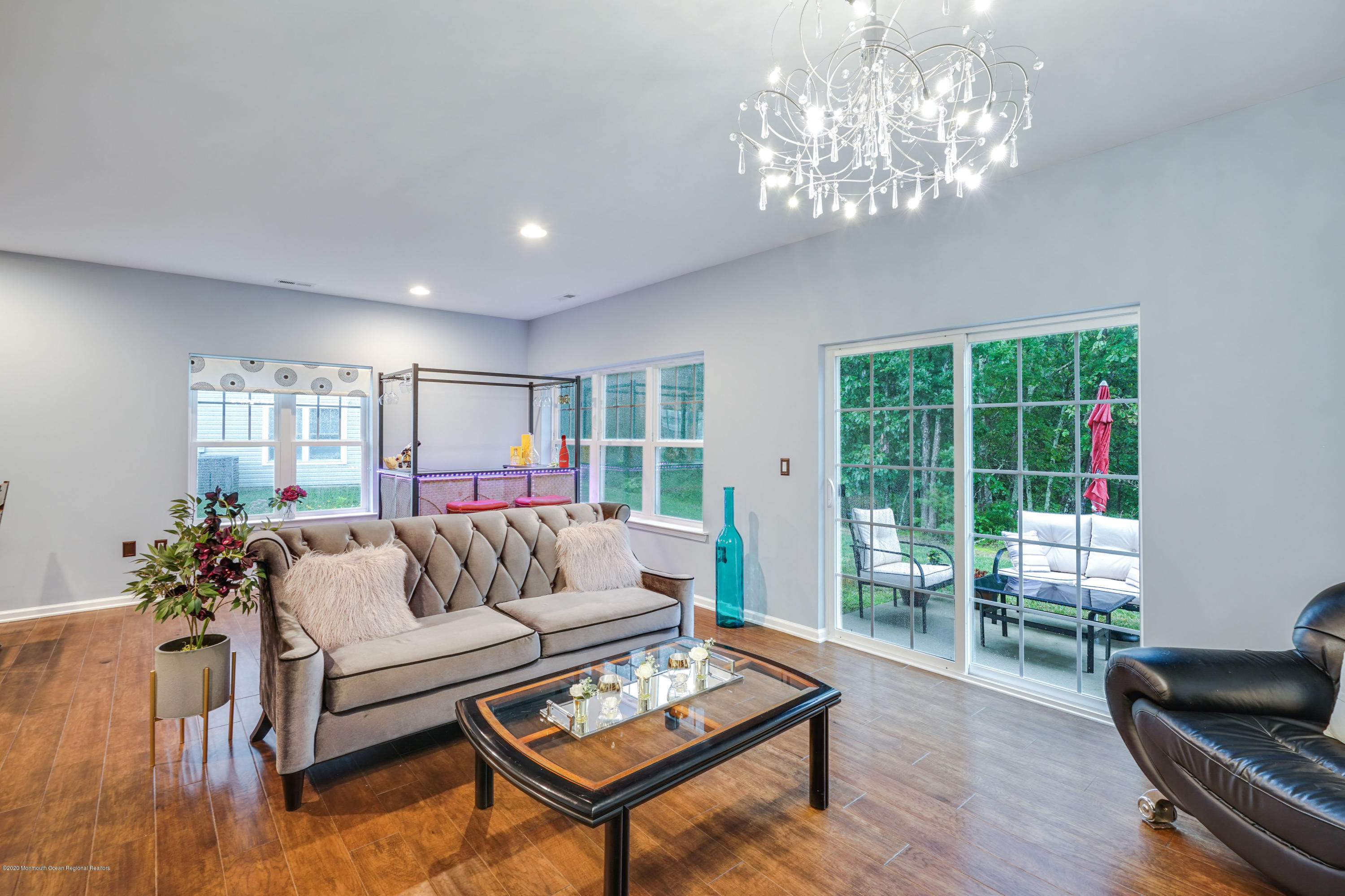 37 Rockingham Way Manchester Township, NJ 08759 - Photo 14 of 36 a living room with furniture and a chandelier