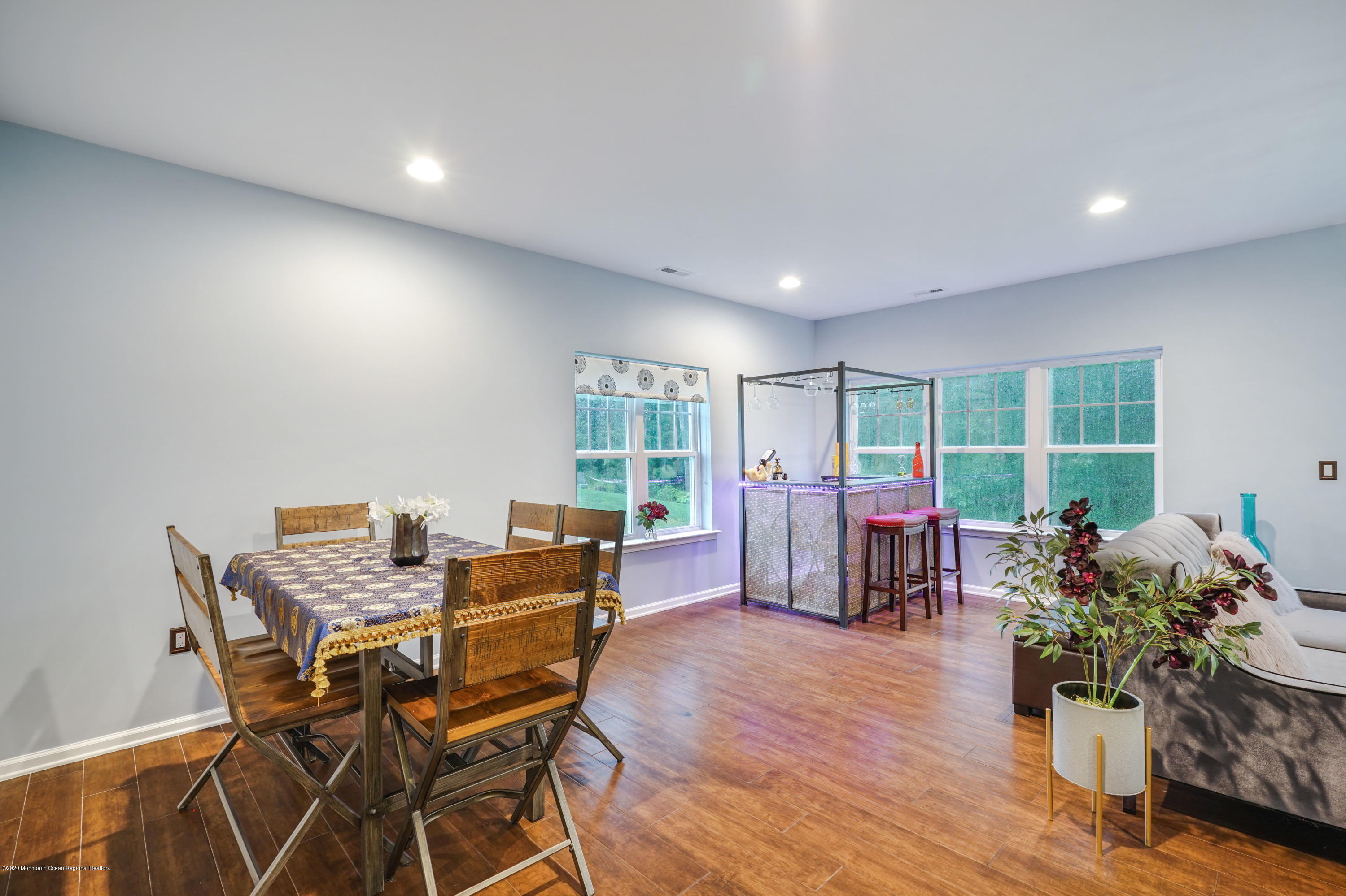 37 Rockingham Way Manchester Township, NJ 08759 - Photo 19 of 36 a dining room with furniture and wooden floor