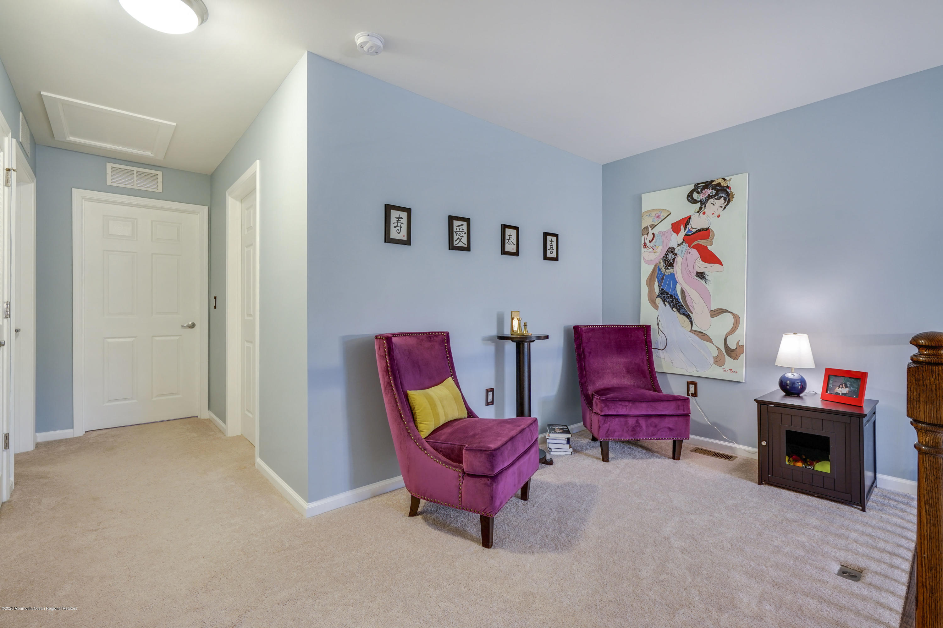 37 Rockingham Way Manchester Township, NJ 08759 - Photo 20 of 36 a living room with furniture a fireplace and a flat screen tv