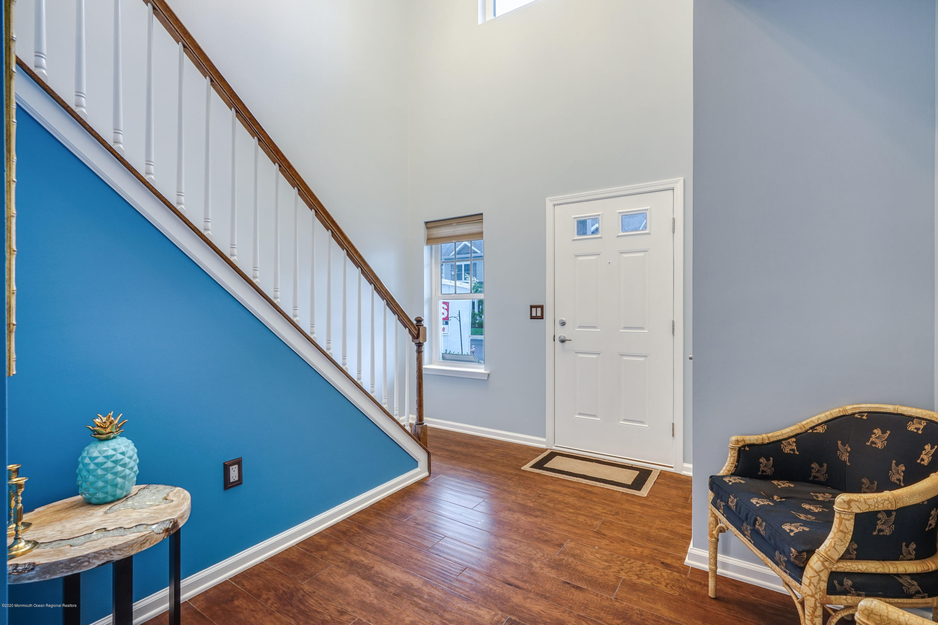 37 Rockingham Way Manchester Township, NJ 08759 - Photo 5 of 36 a living room with furniture stairs and a potted plant