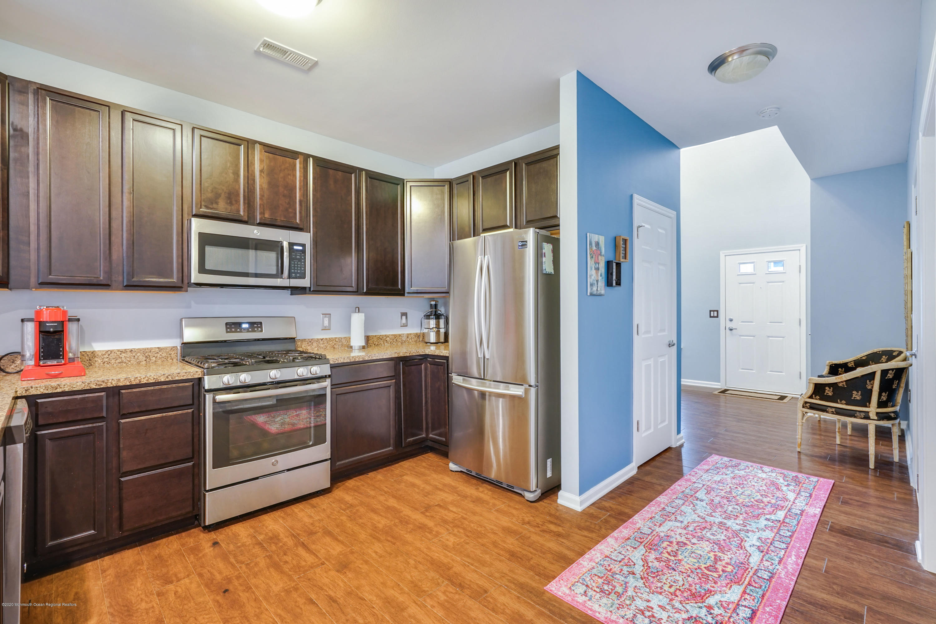 37 Rockingham Way Manchester Township, NJ 08759 - Photo 8 of 36 a kitchen with stainless steel appliances granite countertop a refrigerator stove and sink