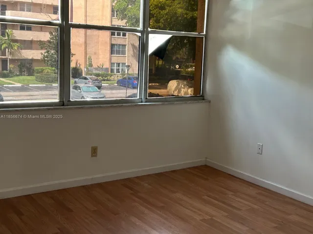a bathroom with a sink and shower