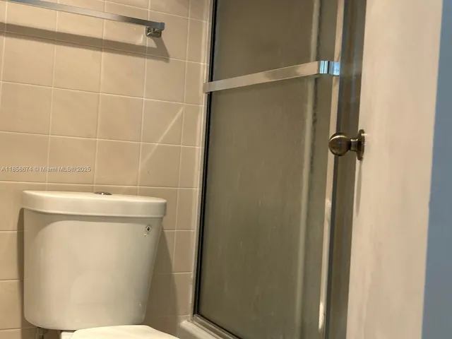 a bathroom with a toilet