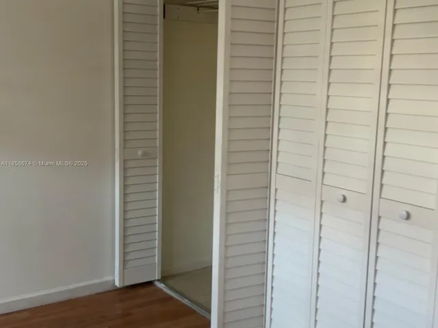 a view of a room with racks on the wall