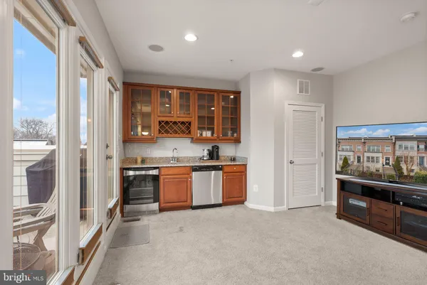 a kitchen with a sink and cabinets