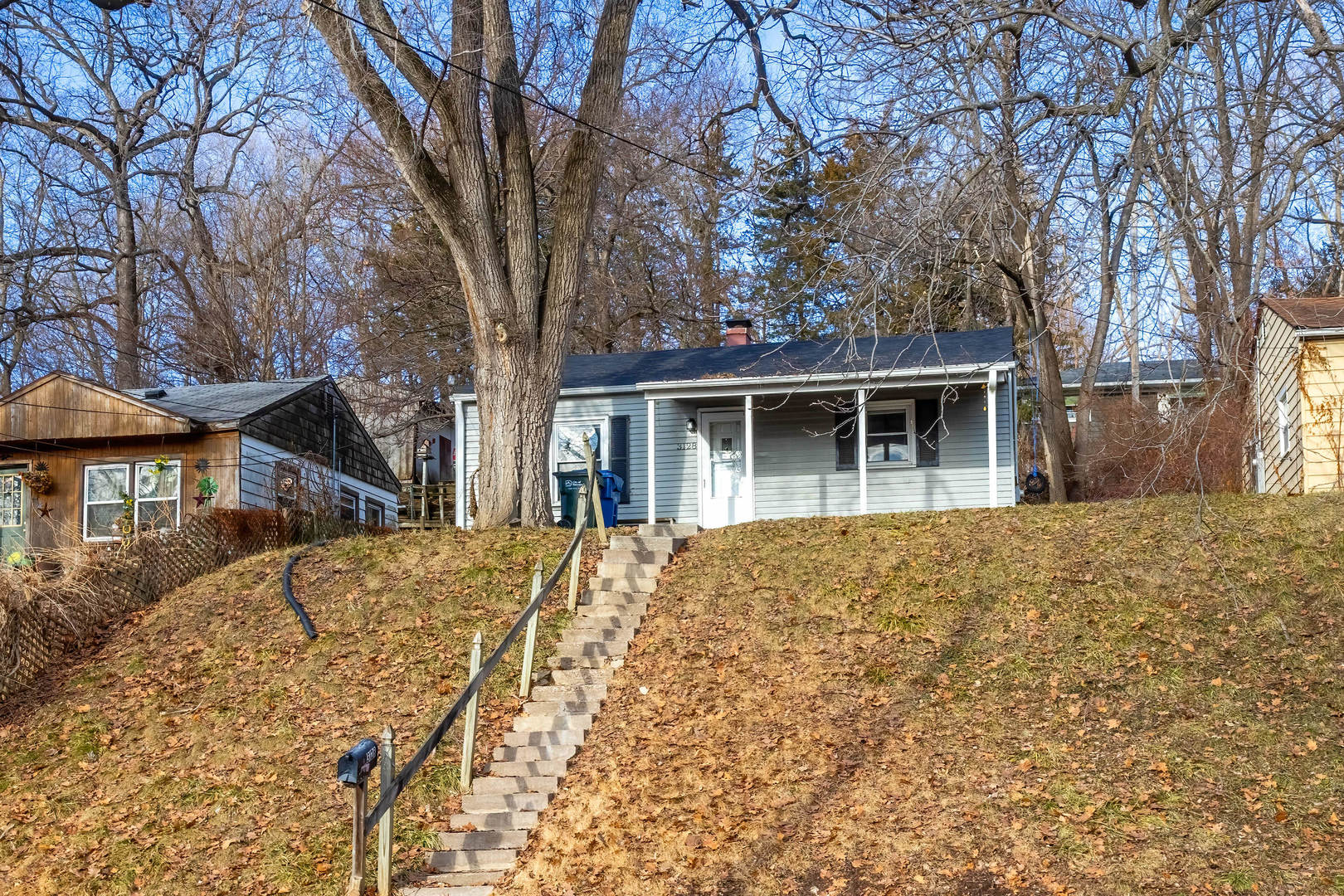 3128 Indian Road Davenport, IA 52802 - Photo 1 of 23 front view of house with a yard