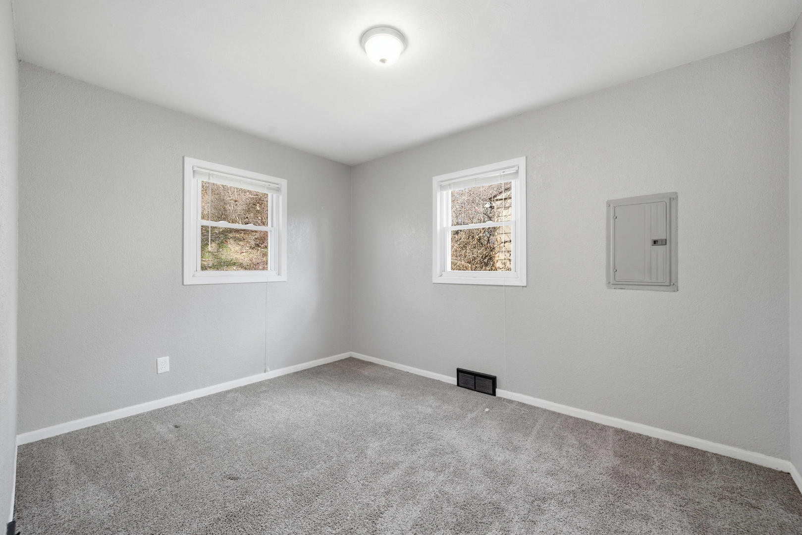 3128 Indian Road Davenport, IA 52802 - Photo 11 of 23 a view of an empty room with a window