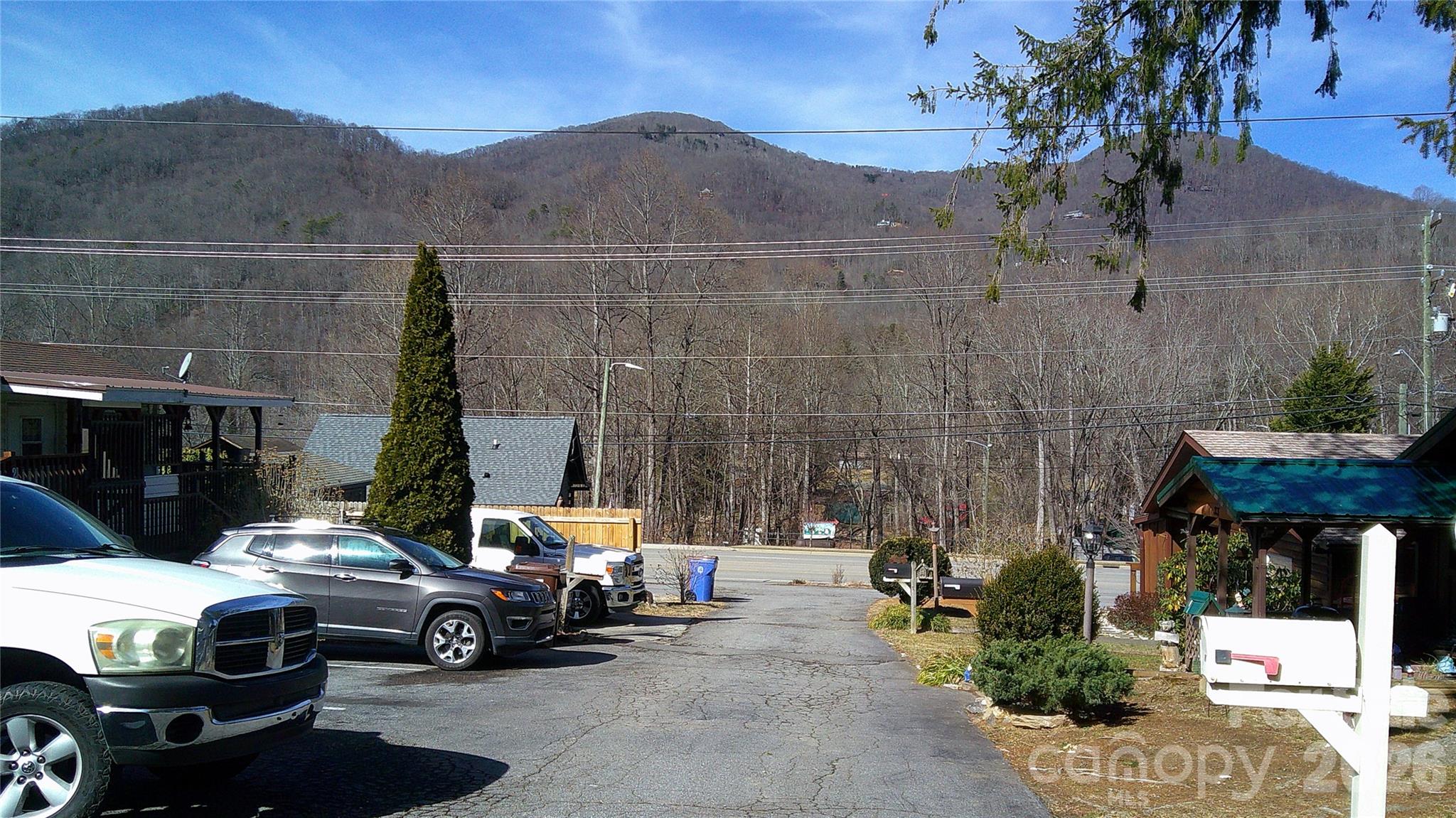 41 Shirdash Street Maggie Valley, NC 28751 - Photo 14 of 18 a car parked on the side of a street