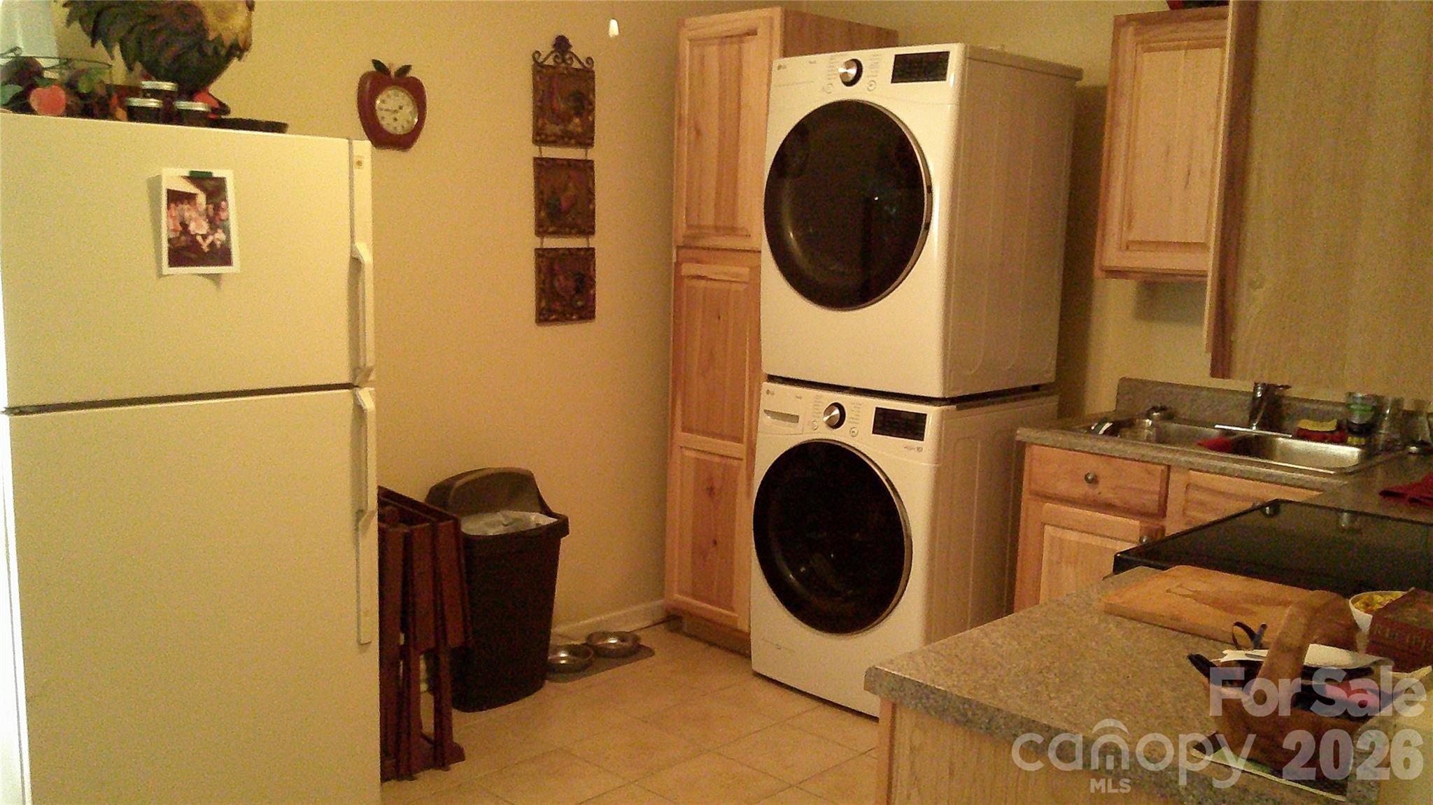 41 Shirdash Street Maggie Valley, NC 28751 - Photo 6 of 18 a utility room with dryer and washer
