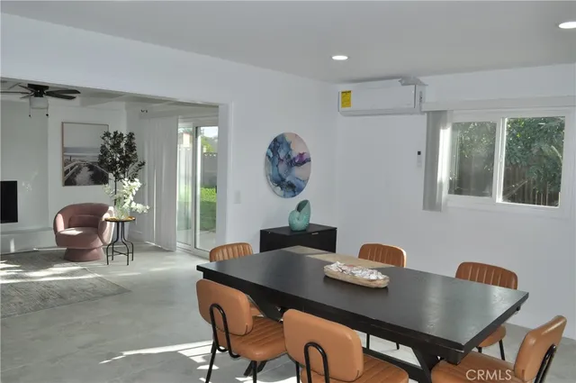 a workspace with furniture and a potted plant