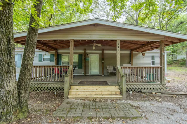 a front view of a house with a porch