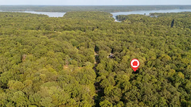 a view of a room with a sink and mountain view in the background
