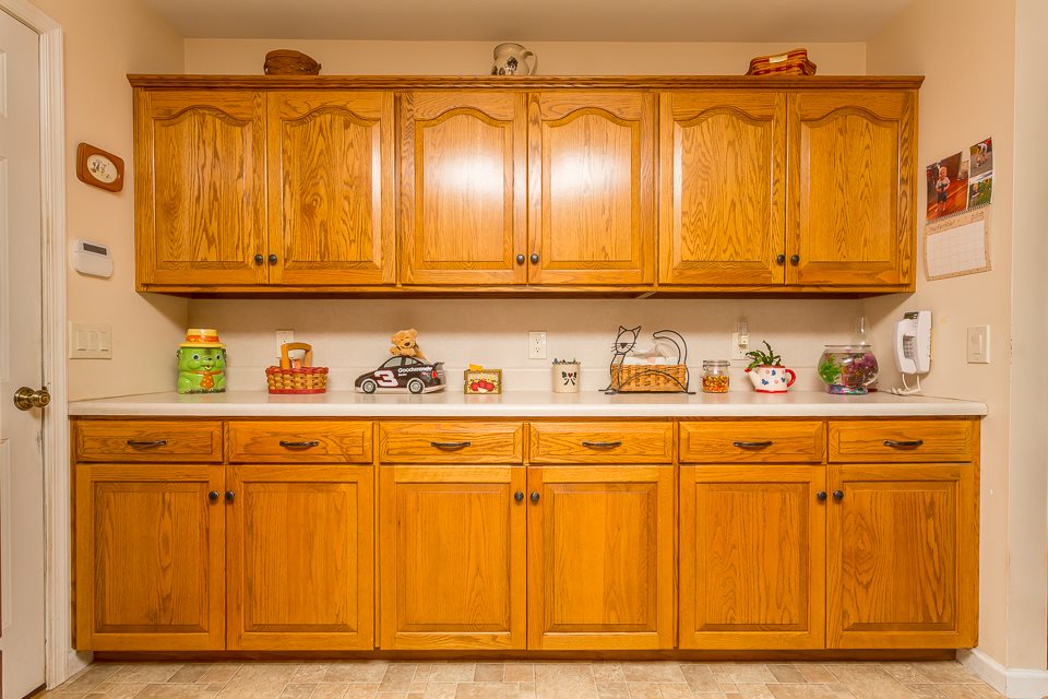 5296 Briery Branch Road Dayton, VA 22821 - Photo 16 of 45 a view of kitchen with granite countertop cabinets and a wooden floor