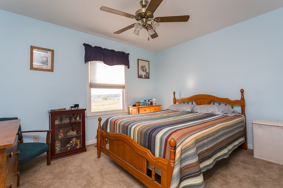 5296 Briery Branch Road Dayton, VA 22821 - Photo 20 of 45 a bedroom with bed and a window