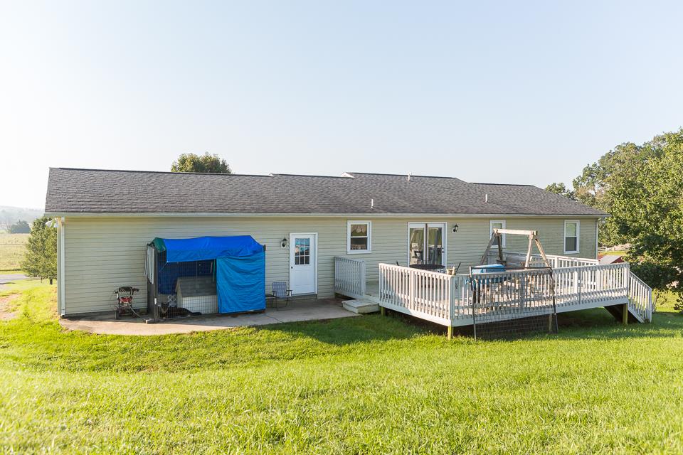 5296 Briery Branch Road Dayton, VA 22821 - Photo 32 of 45 front view of house with a yard