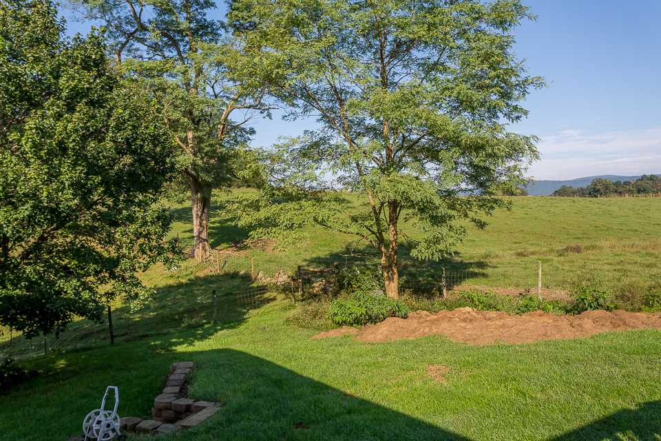 5296 Briery Branch Road Dayton, VA 22821 - Photo 42 of 45 a view of a lake with a yard