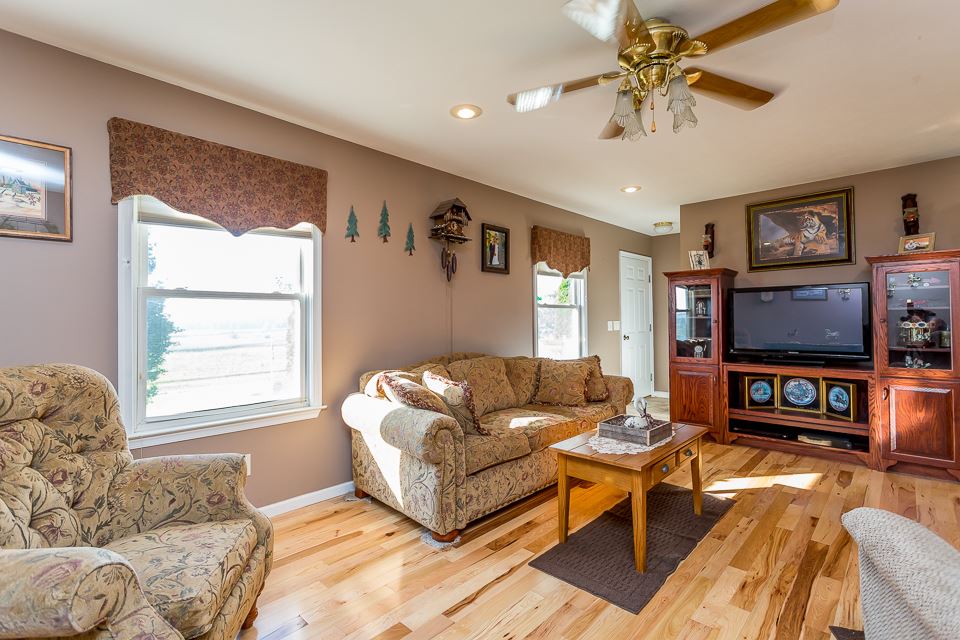 5296 Briery Branch Road Dayton, VA 22821 - Photo 8 of 45 a living room with furniture and a flat screen tv