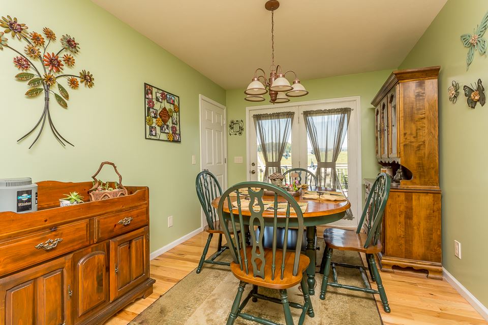 5296 Briery Branch Road Dayton, VA 22821 - Photo 10 of 45 a view of a dining room with furniture window and outside view