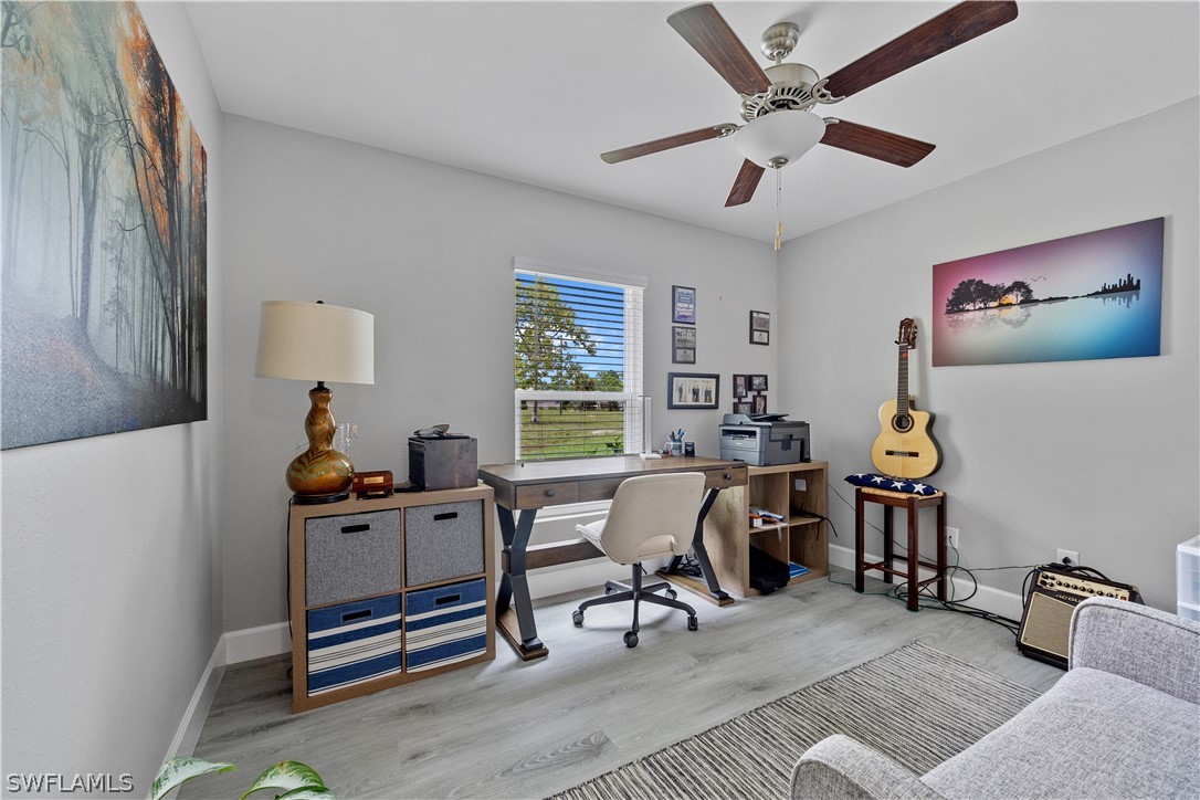 16582 Becasse Drive Punta Gorda, FL 33955 - Photo 18 of 32 a view of a workspace with furniture and a window