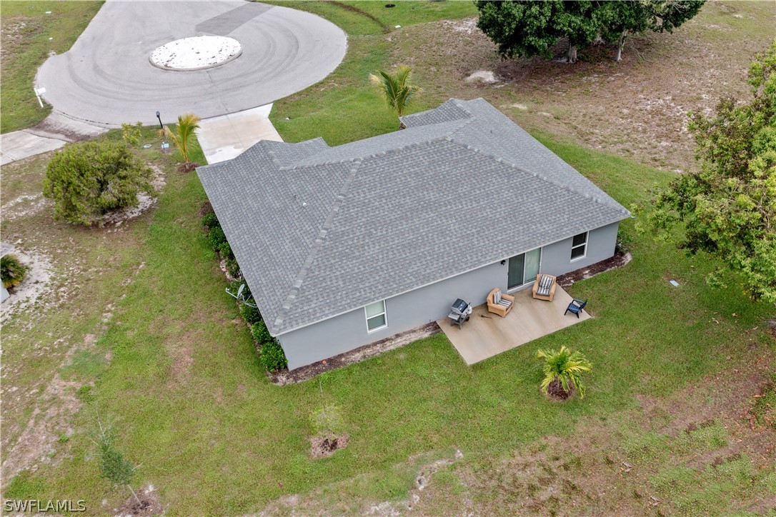 16582 Becasse Drive Punta Gorda, FL 33955 - Photo 25 of 32 an aerial view of a house with backyard space and balcony