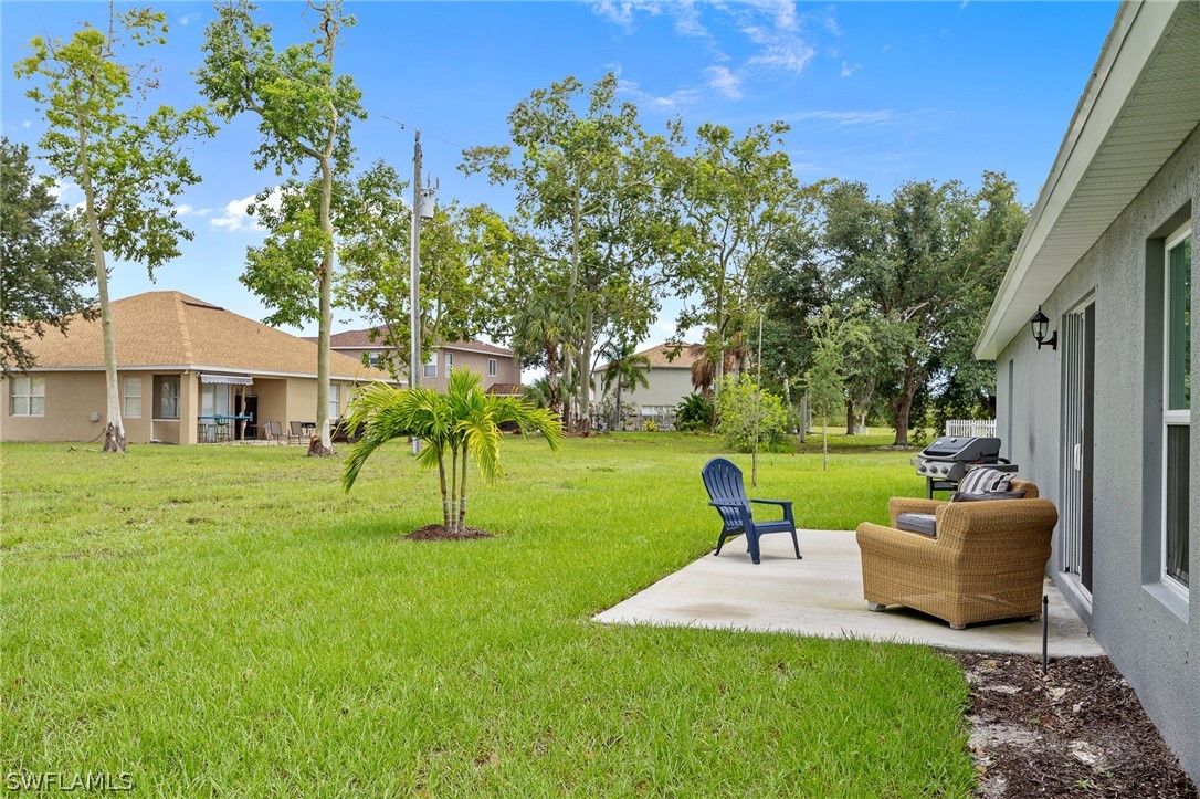16582 Becasse Drive Punta Gorda, FL 33955 - Photo 28 of 32 a view of a house with a yard porch and sitting area