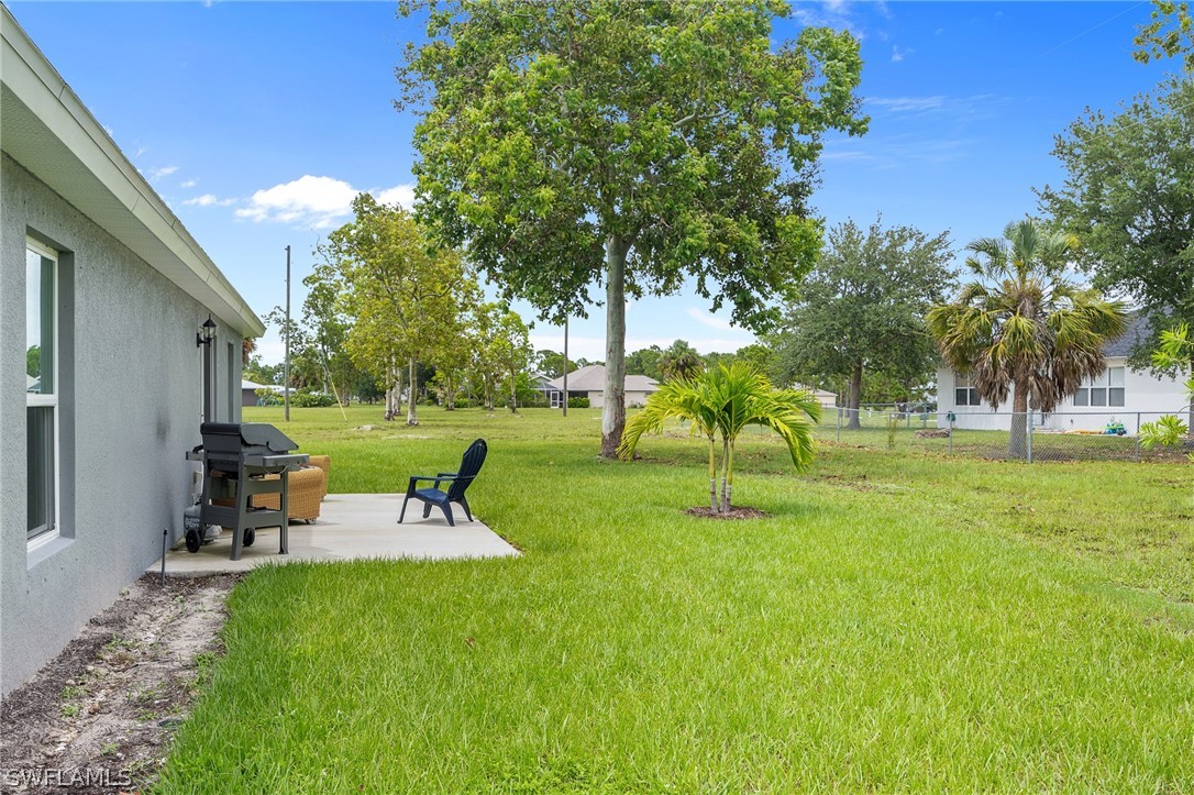 16582 Becasse Drive Punta Gorda, FL 33955 - Photo 29 of 32 a view of a park with swings and slides