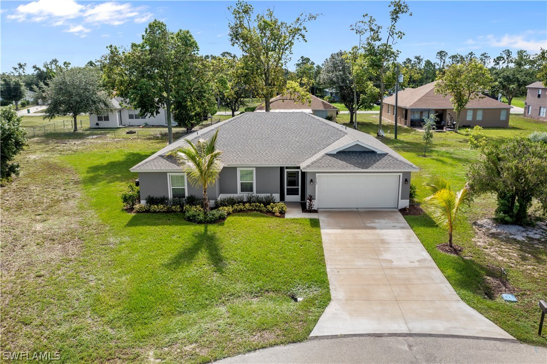 16582 Becasse Drive Punta Gorda, FL 33955 - Photo 30 of 32 a aerial view of a house with swimming pool and sitting area