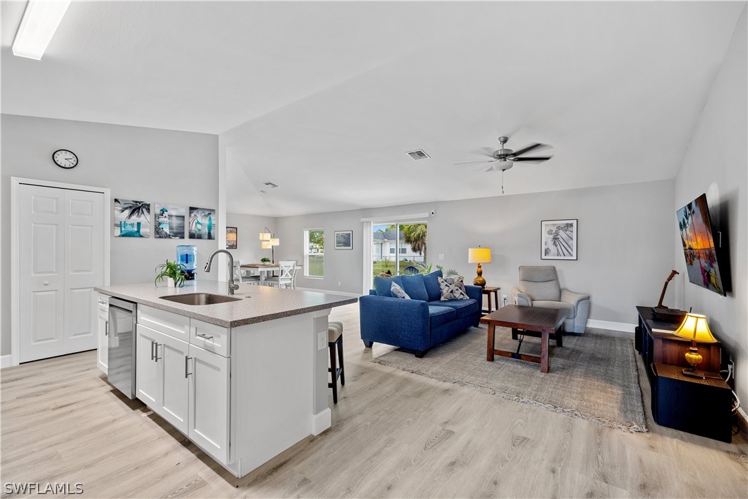 16582 Becasse Drive Punta Gorda, FL 33955 - Photo 3 of 32 a living room with furniture and a flat screen tv