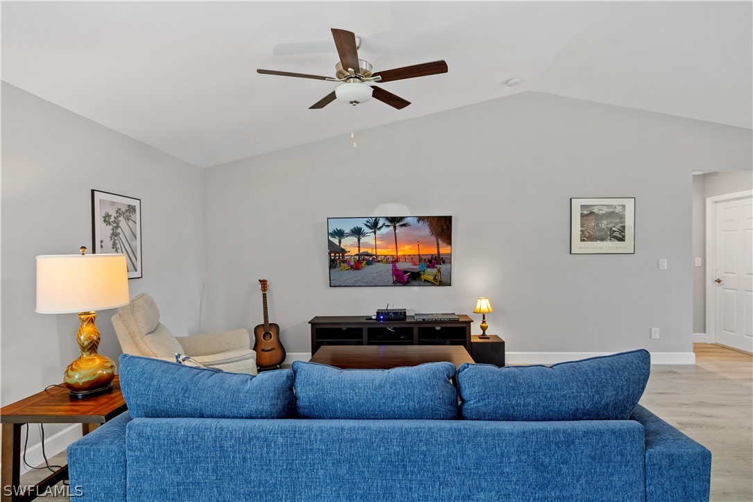 16582 Becasse Drive Punta Gorda, FL 33955 - Photo 5 of 32 a living room with furniture and a flat screen tv