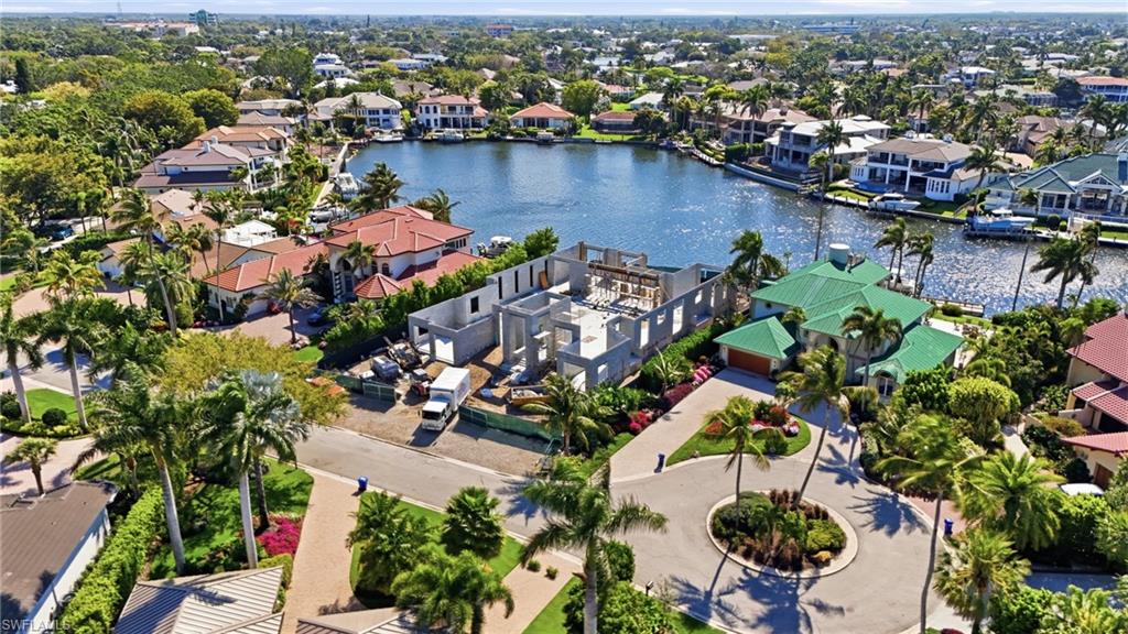 310 Pirates Bight Naples, FL 34103 - Photo 14 of 16 an aerial view of a city with lots of residential buildings
