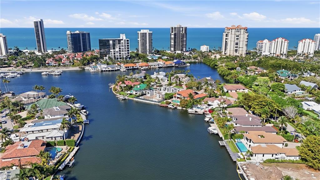 310 Pirates Bight Naples, FL 34103 - Photo 15 of 16 a view of a city and an outdoor space