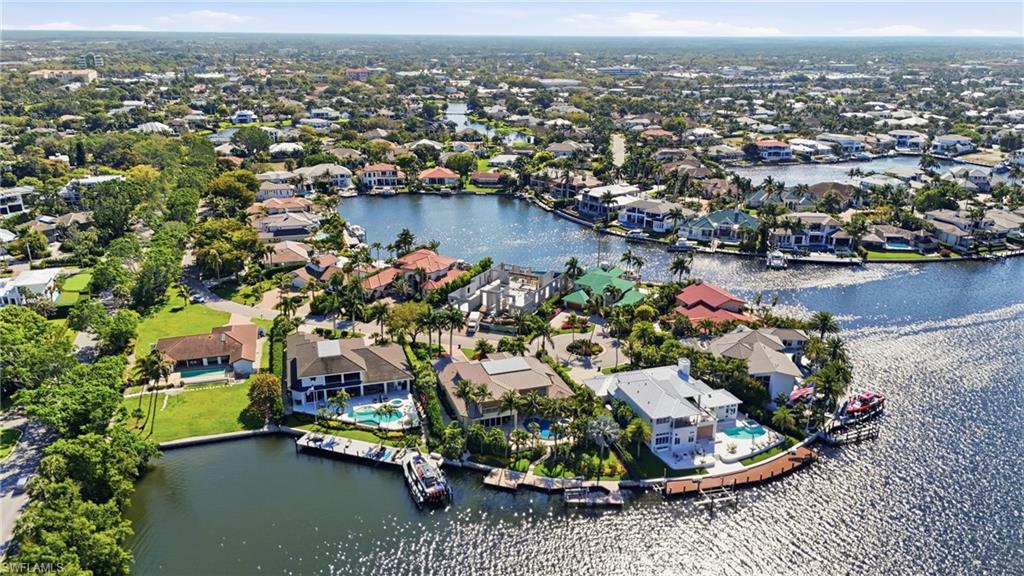 310 Pirates Bight Naples, FL 34103 - Photo 8 of 16 an aerial view of a city