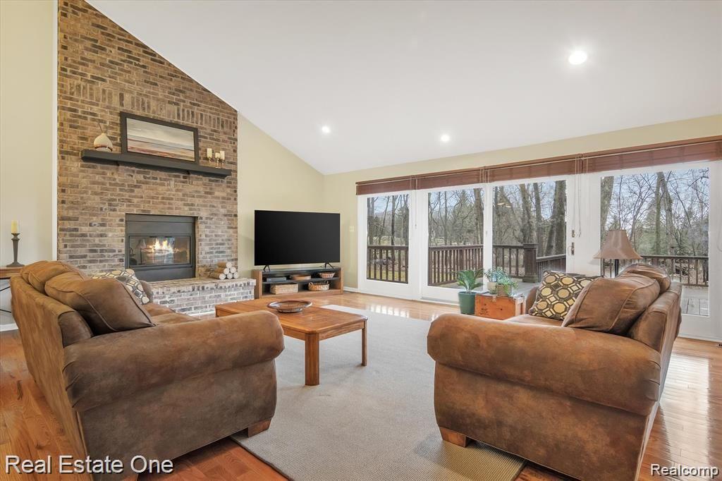 3511 Fenton Road Hartland, MI 48353 - Photo 7 of 47 Beautiful Brick Floor to Ceiling Fireplace