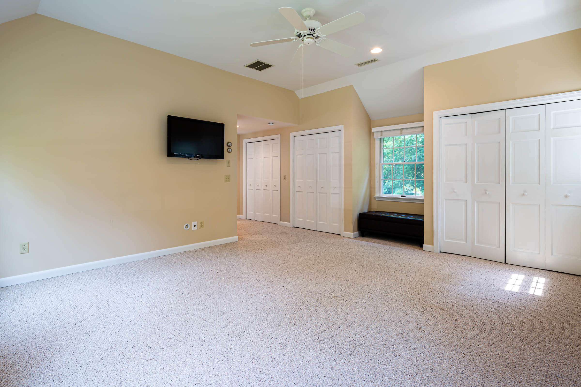 176 Monument Road Orleans, MA 02653 - Photo 25 of 55 an empty room with windows and cabinet
