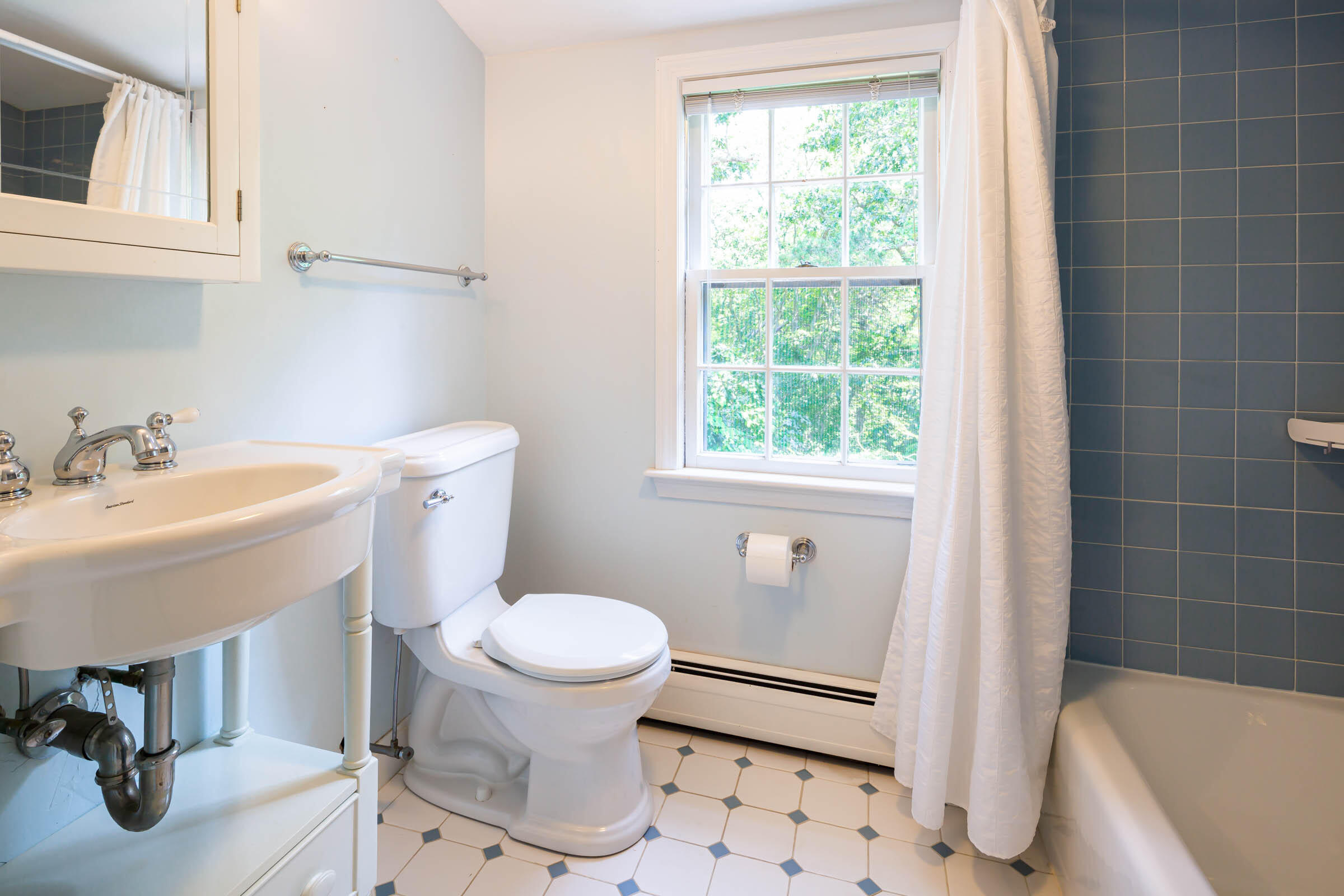 176 Monument Road Orleans, MA 02653 - Photo 34 of 55 a bathroom with a sink toilet and shower