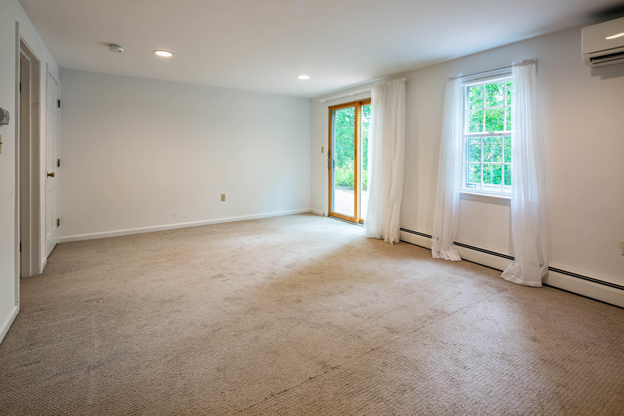 176 Monument Road Orleans, MA 02653 - Photo 37 of 55 an empty room with windows and closet