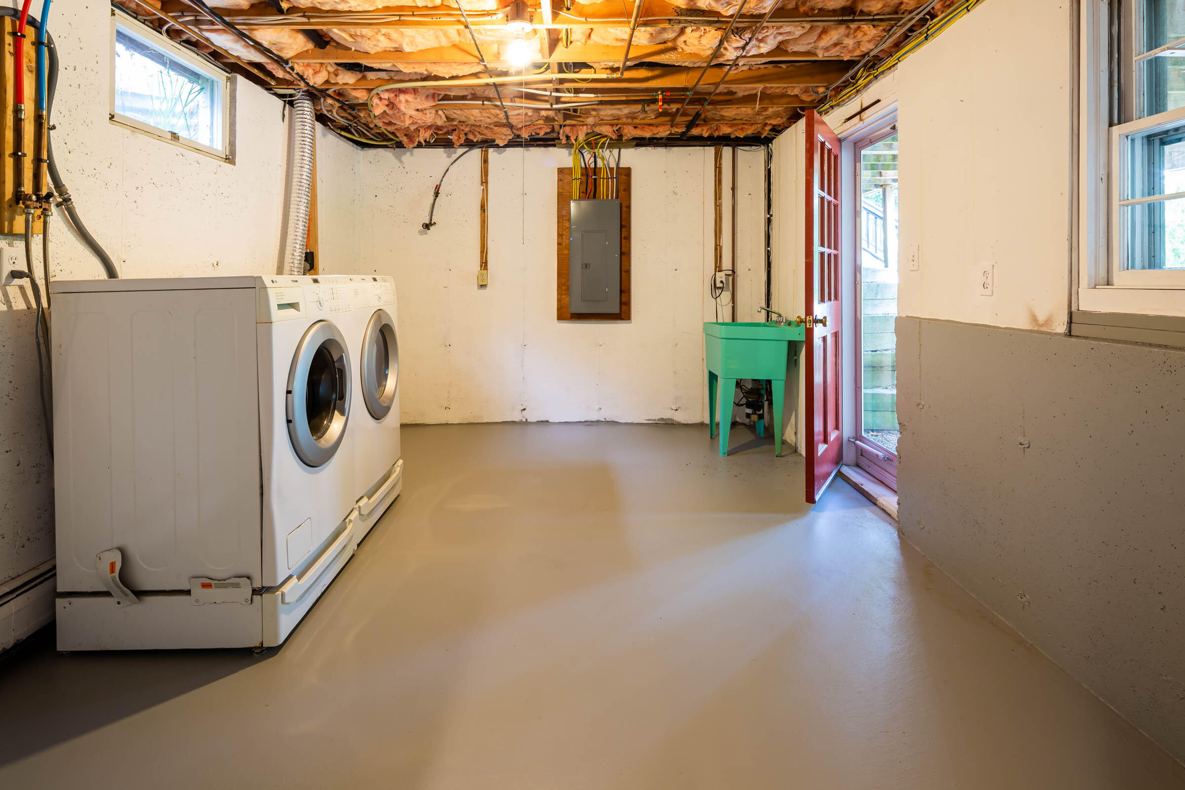 176 Monument Road Orleans, MA 02653 - Photo 40 of 55 a view of a storage & utility room with washer and dryer