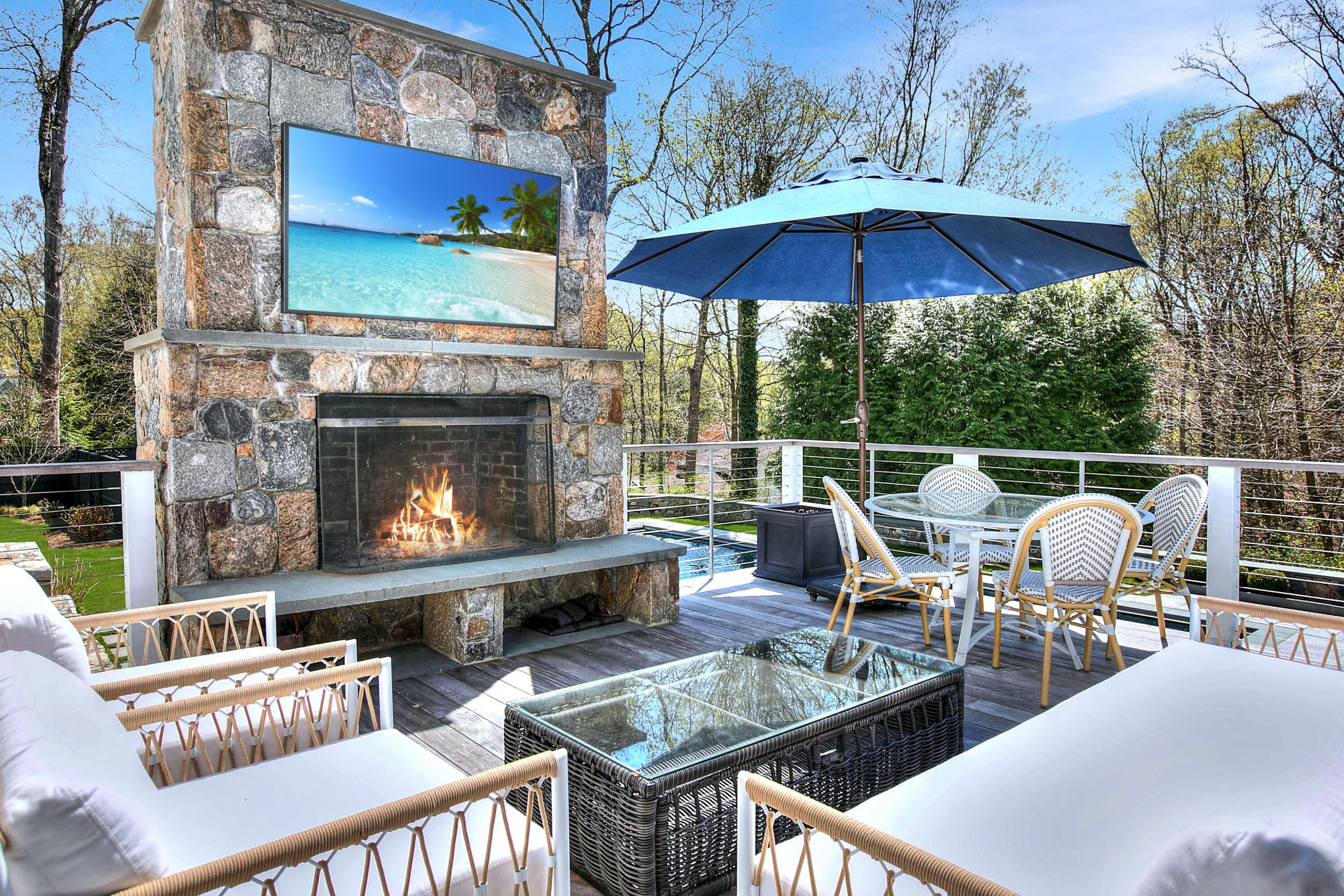 128 Dunning Road New Canaan, CT 06840 - Photo 12 of 49 a outdoor living space with furniture and a fireplace