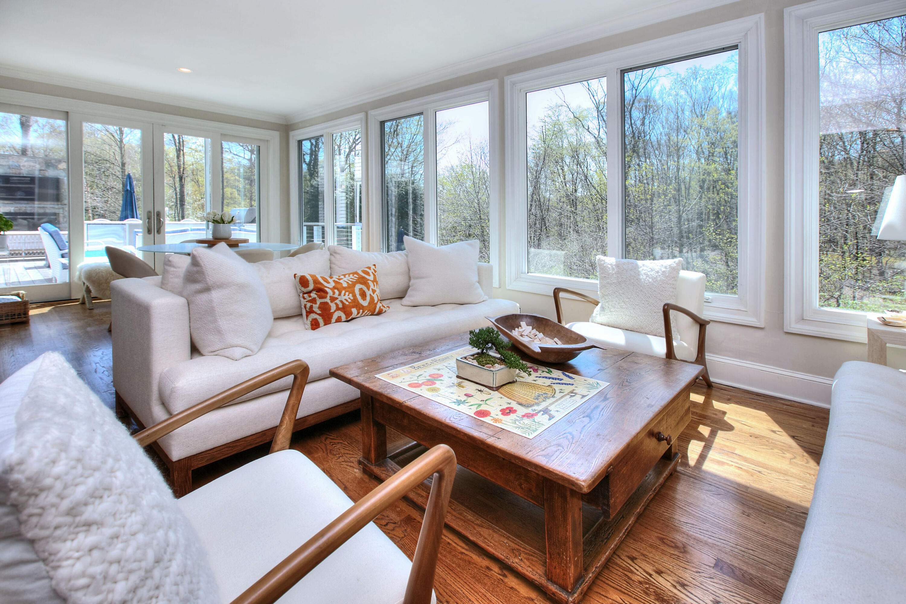 128 Dunning Road New Canaan, CT 06840 - Photo 17 of 49 a living room with furniture and a large window