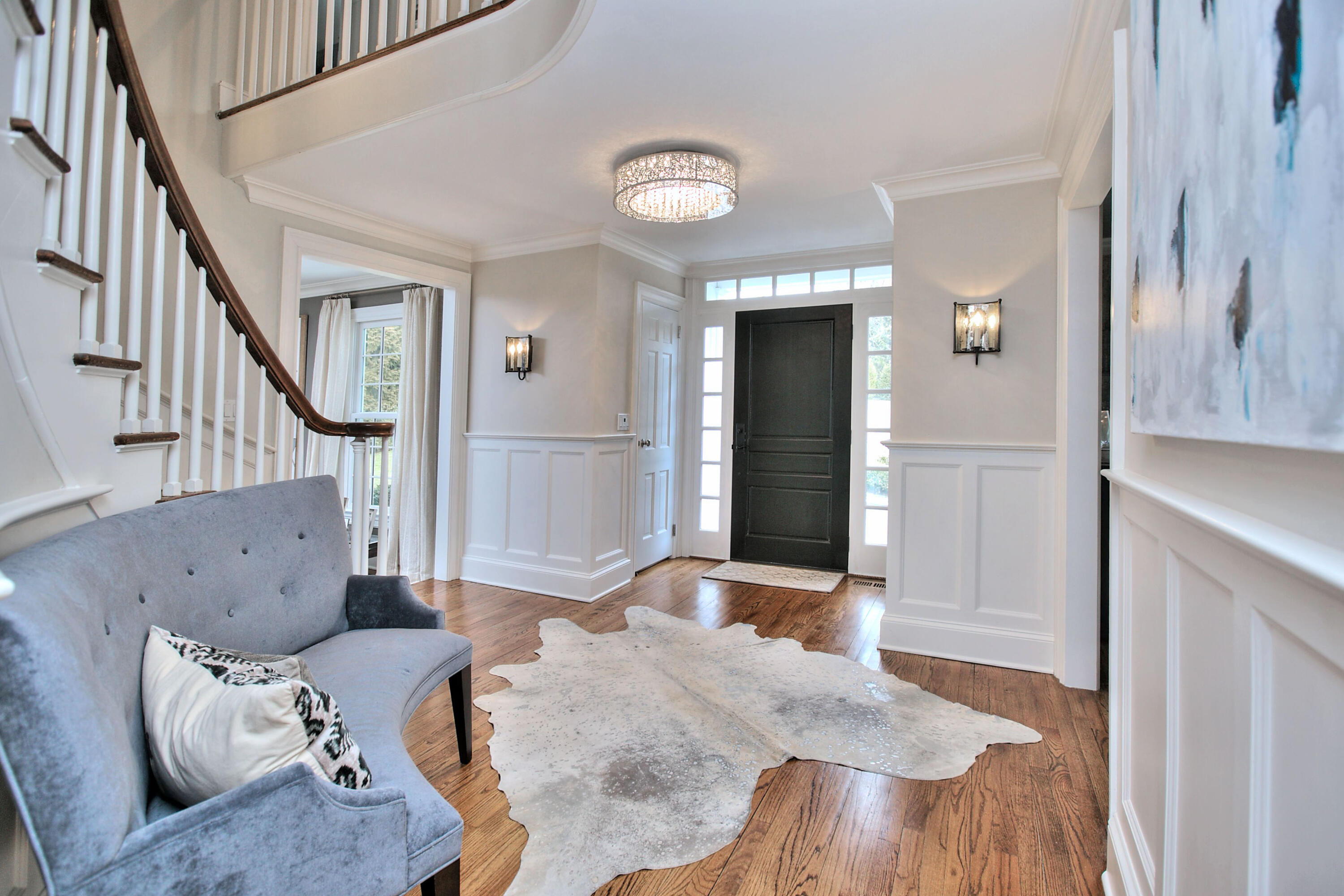 128 Dunning Road New Canaan, CT 06840 - Photo 2 of 49 a bedroom with furniture and a wooden floor