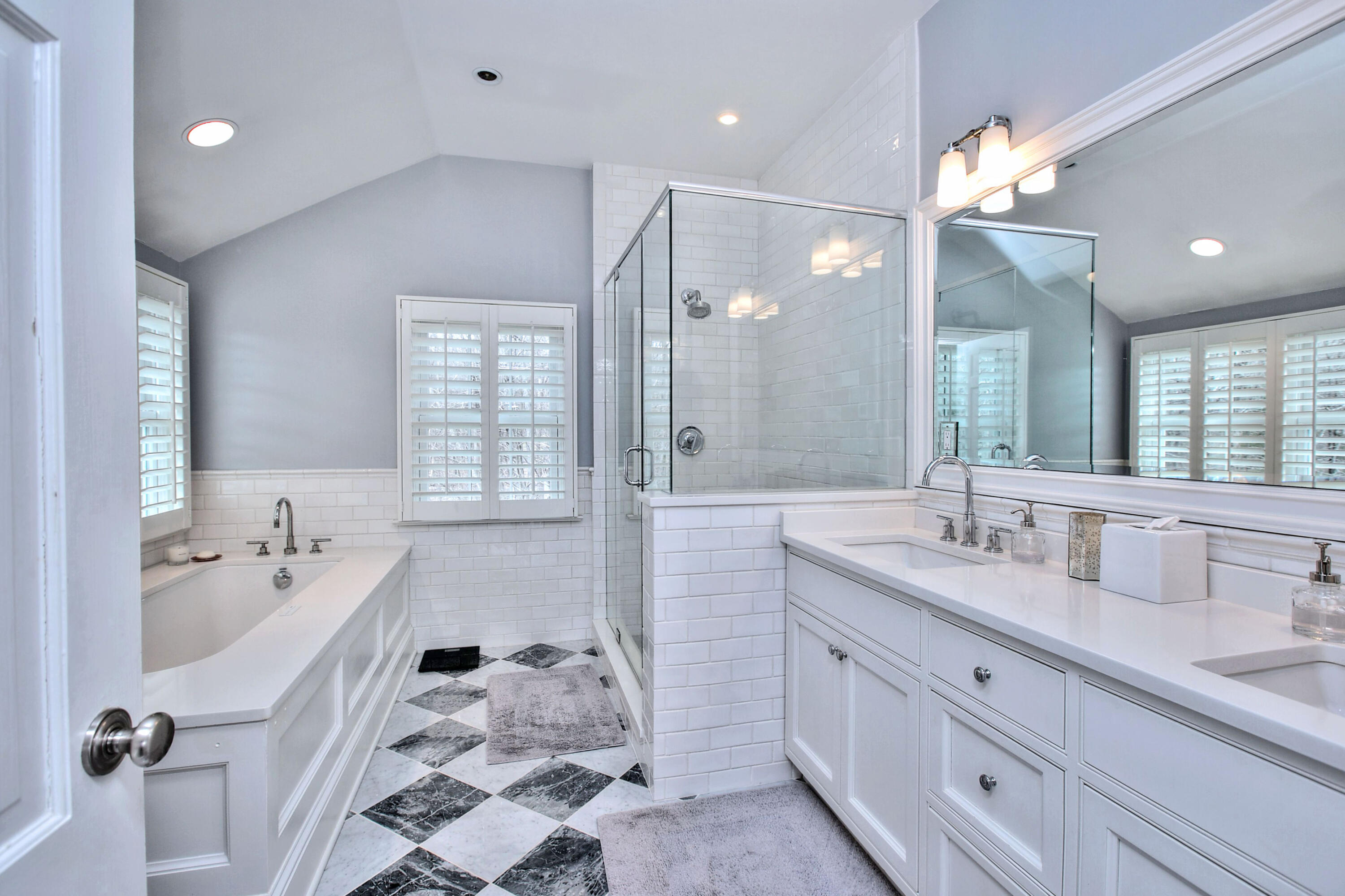 128 Dunning Road New Canaan, CT 06840 - Photo 21 of 49 a bathroom with a granite countertop sink mirror and bathtub