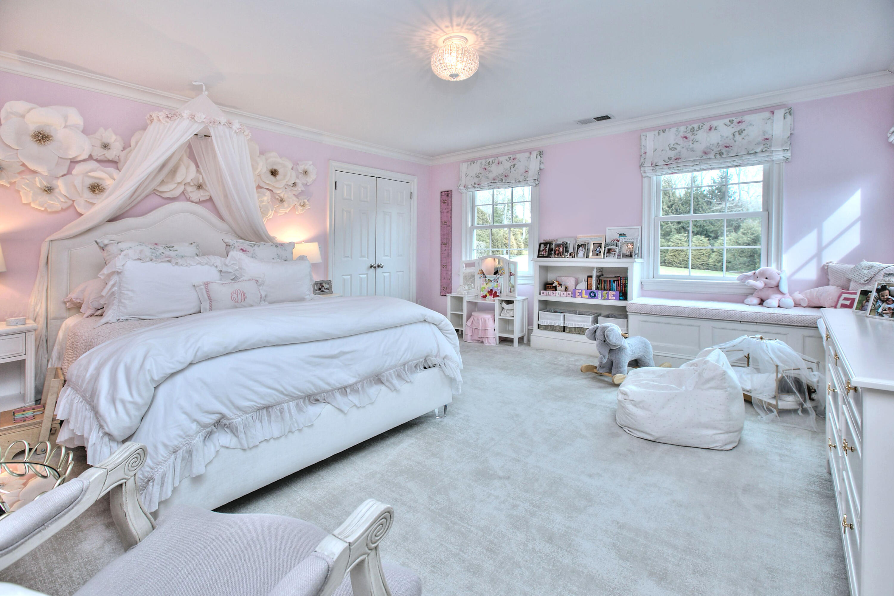 128 Dunning Road New Canaan, CT 06840 - Photo 27 of 49 a spacious bedroom with a bed and window