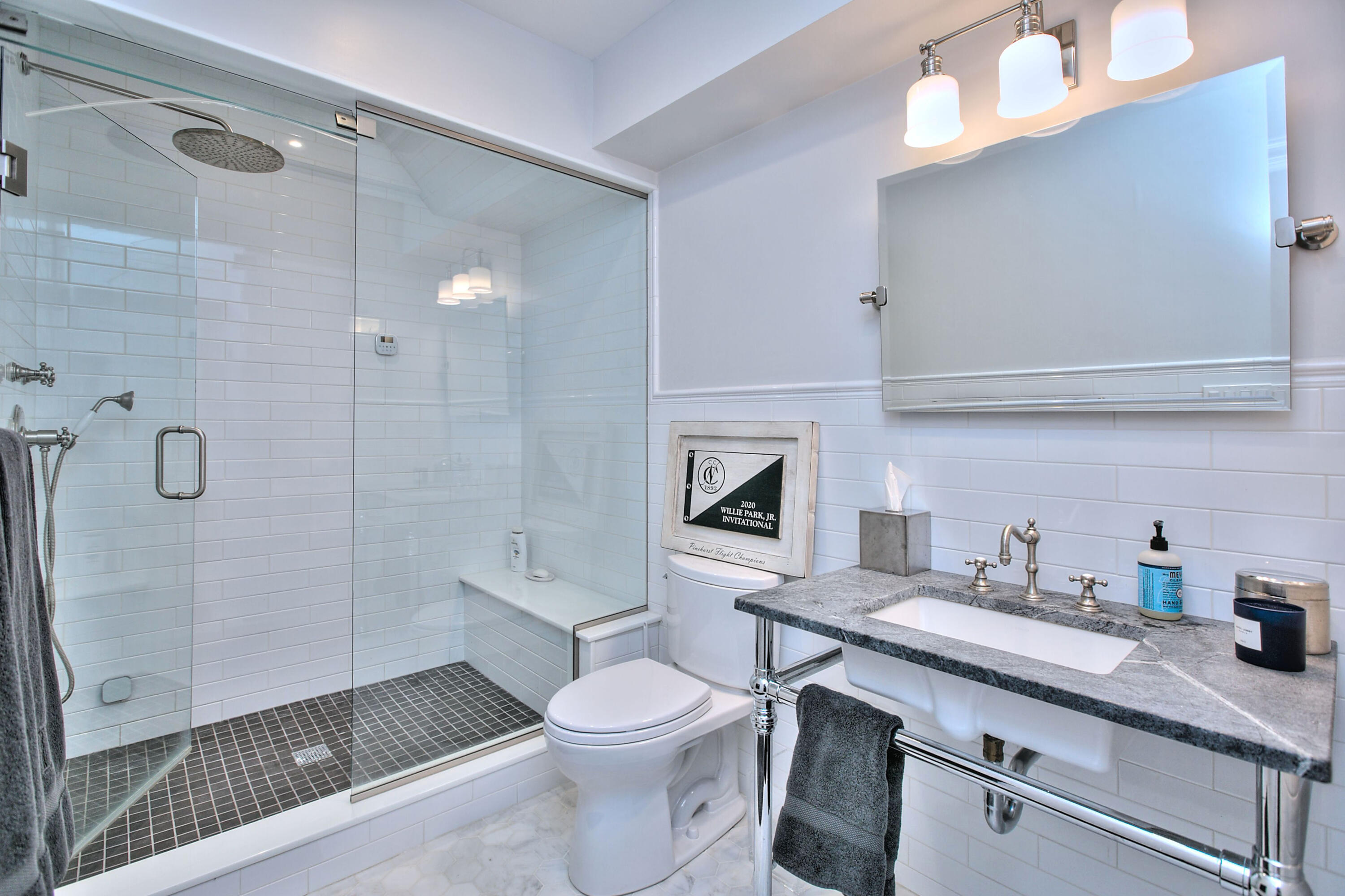 128 Dunning Road New Canaan, CT 06840 - Photo 37 of 49 a bathroom with a sink a toilet and shower