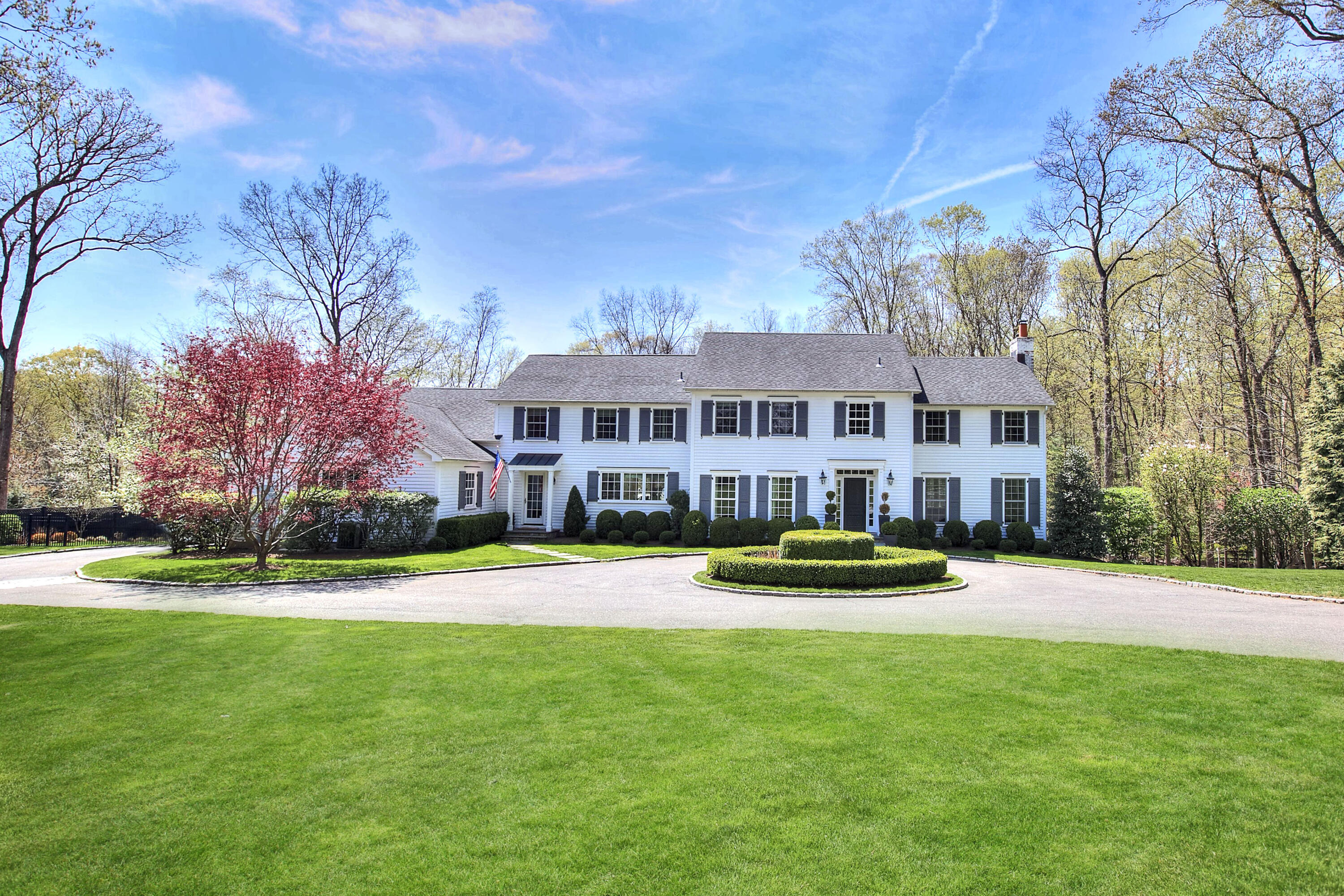 128 Dunning Road New Canaan, CT 06840 - Photo 45 of 49 a view of a house with a yard