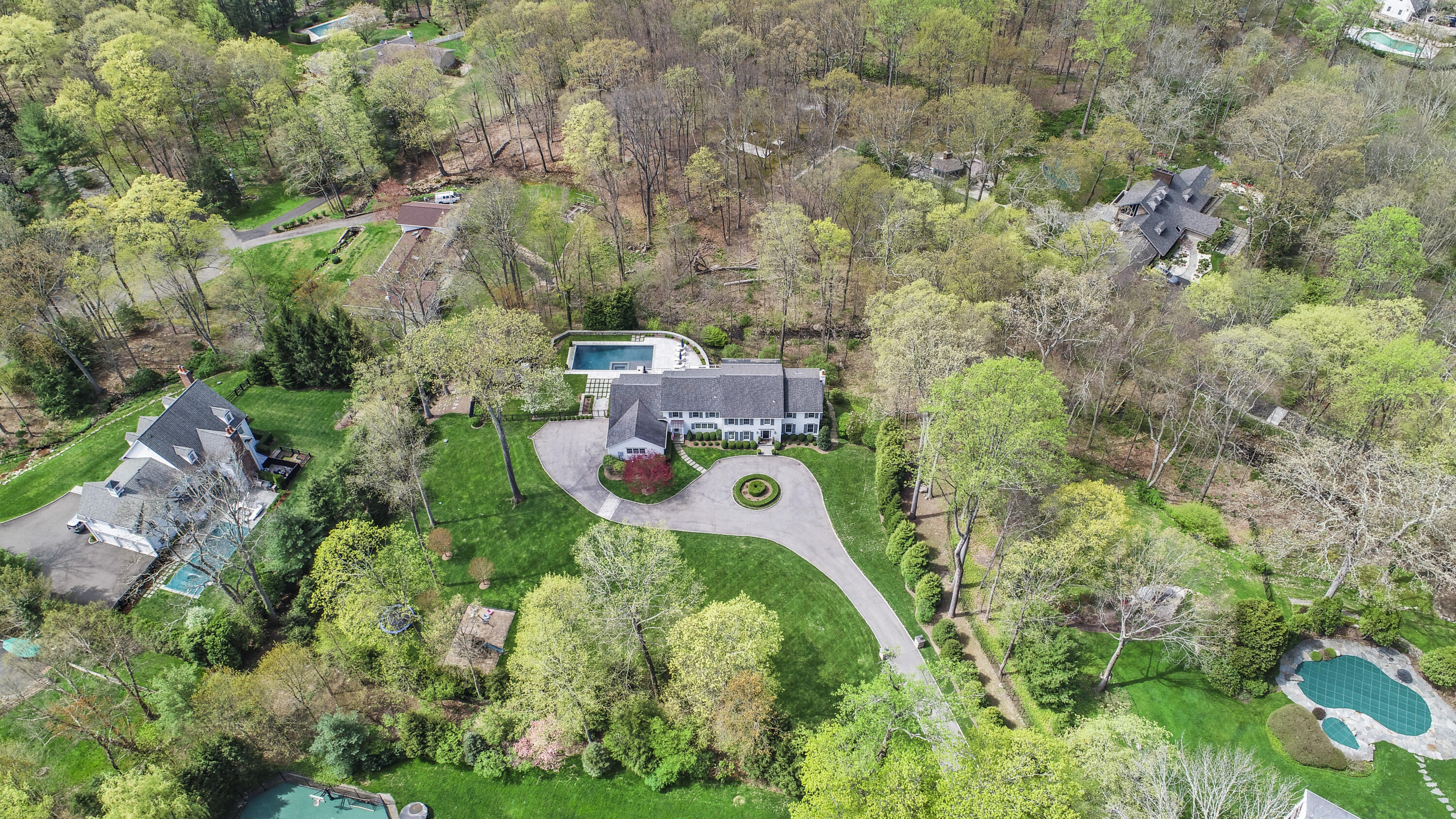 128 Dunning Road New Canaan, CT 06840 - Photo 46 of 49 an aerial view of a house with a yard