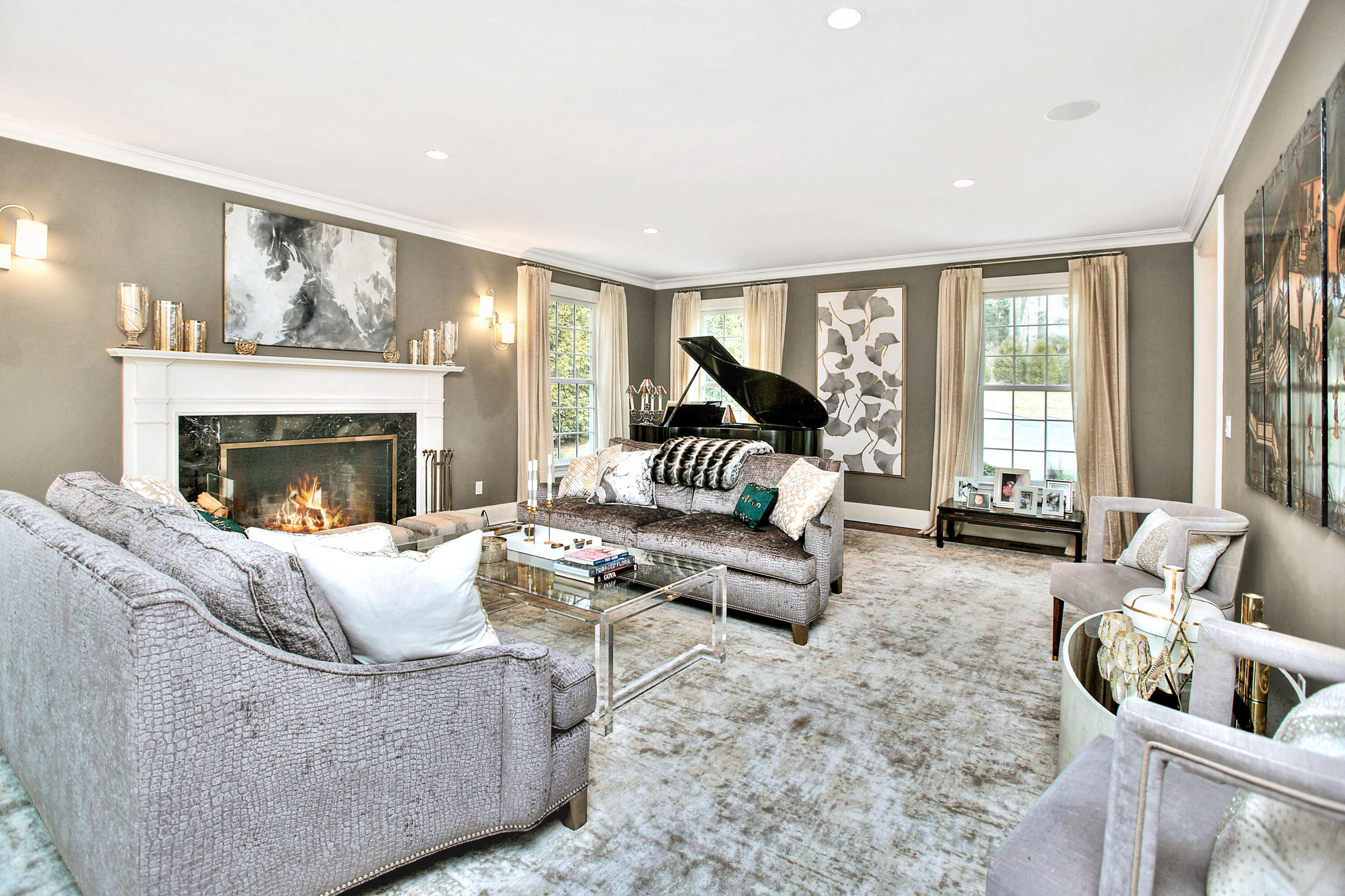 128 Dunning Road New Canaan, CT 06840 - Photo 5 of 49 a living room with furniture and a fireplace