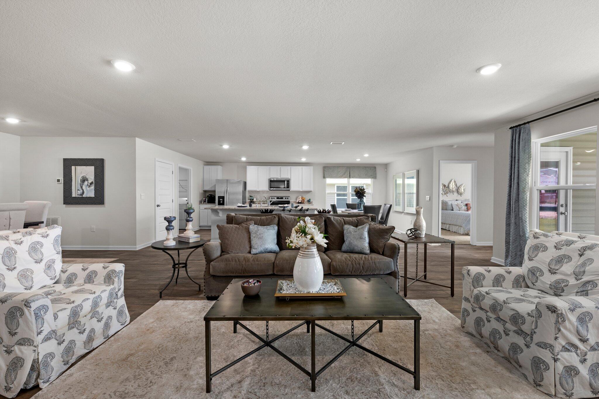 9318 Tara Circle Milton, FL 32583 - Photo 6 of 30 a living room with furniture and a table