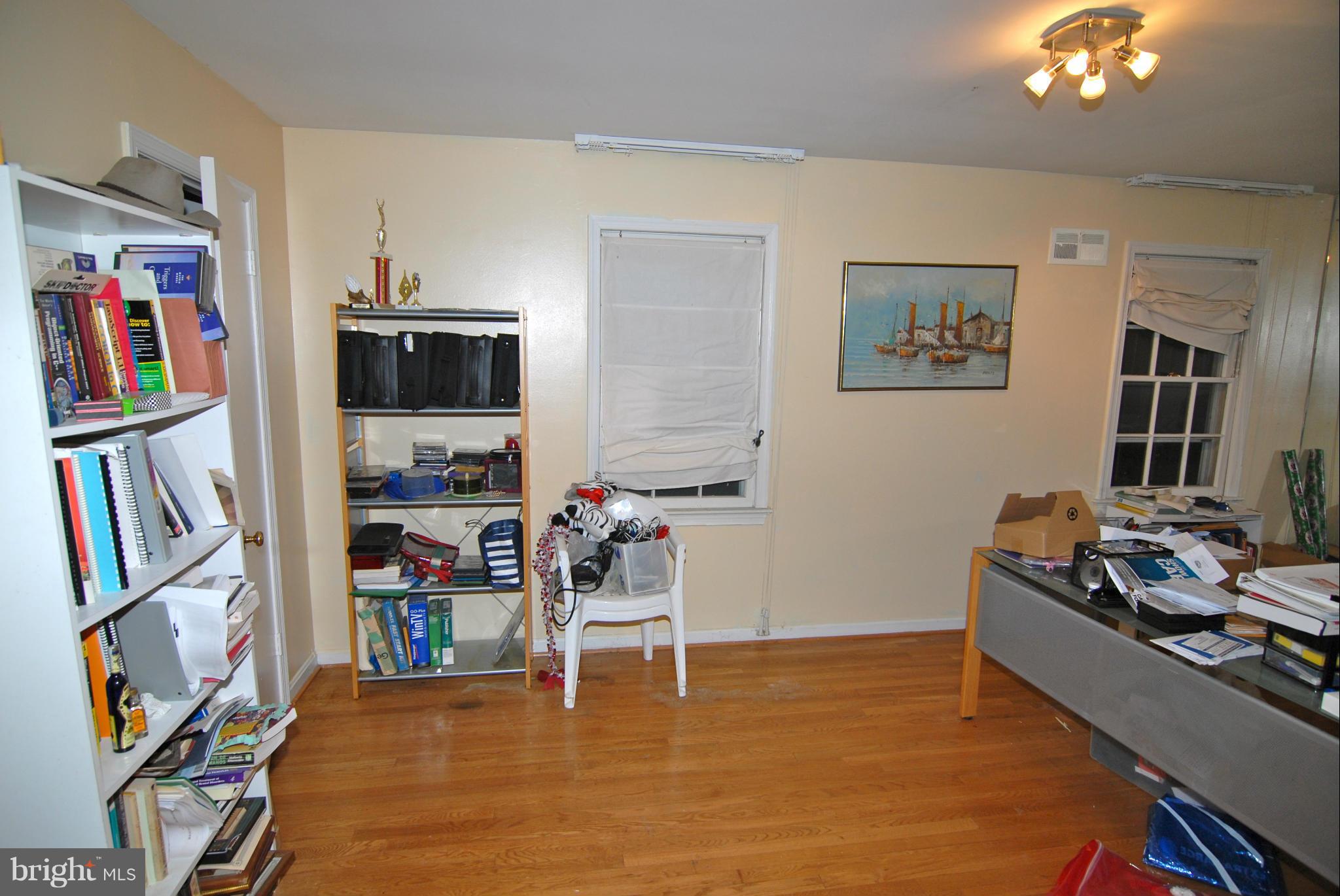 13617 Middlevale Lane Silver Spring, MD 20906 - Photo 14 of 18 a living room with furniture and a flat screen tv
