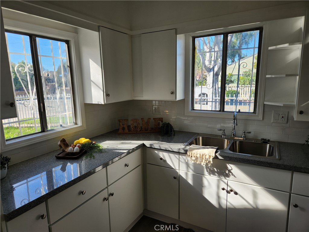 5301 Aldrich Road South Gate, CA 90280 - Photo 4 of 7 a kitchen with a sink and a window